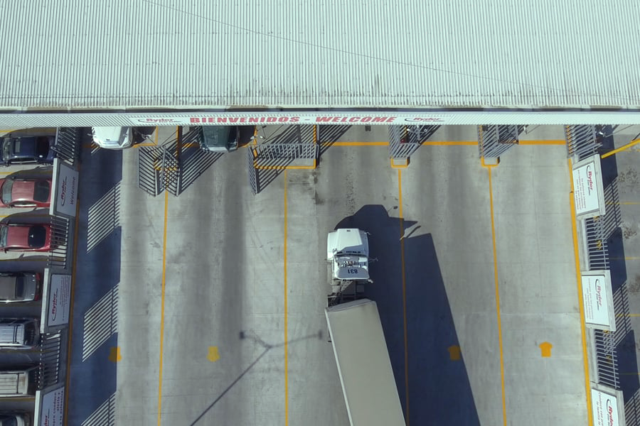 commercial truck entering a parking dock station